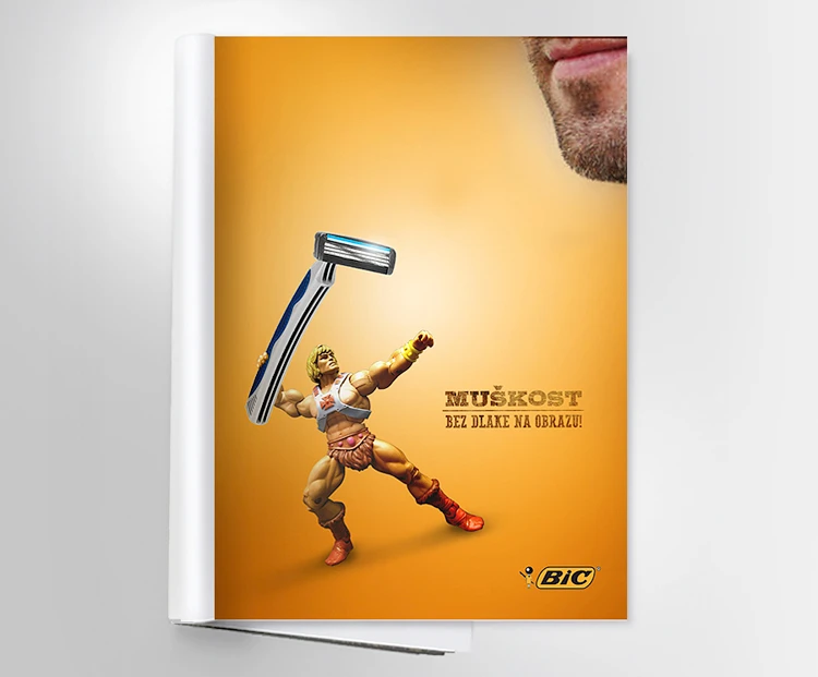 BIC shaver print advertisement with a toy action figure.